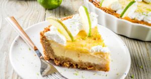 Sliced Homemade Key Lime Pie with Whipped Cream