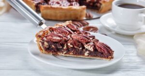 Sliced Pecan Pie with Coffee