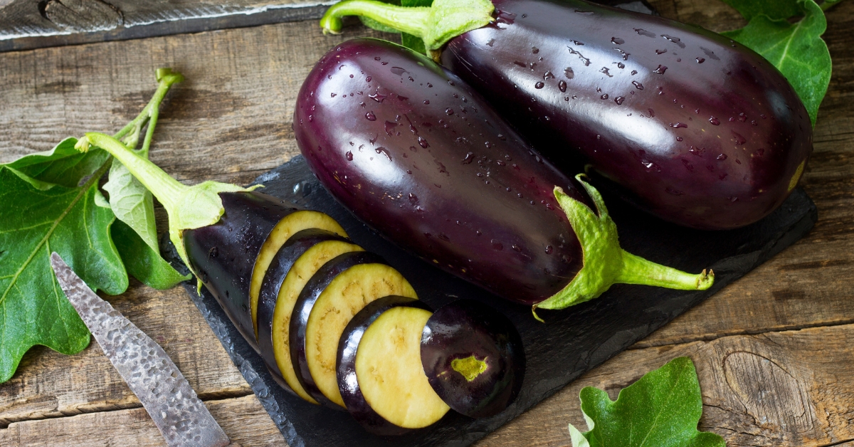 Sliced and Whole Organic Purple Eggplant