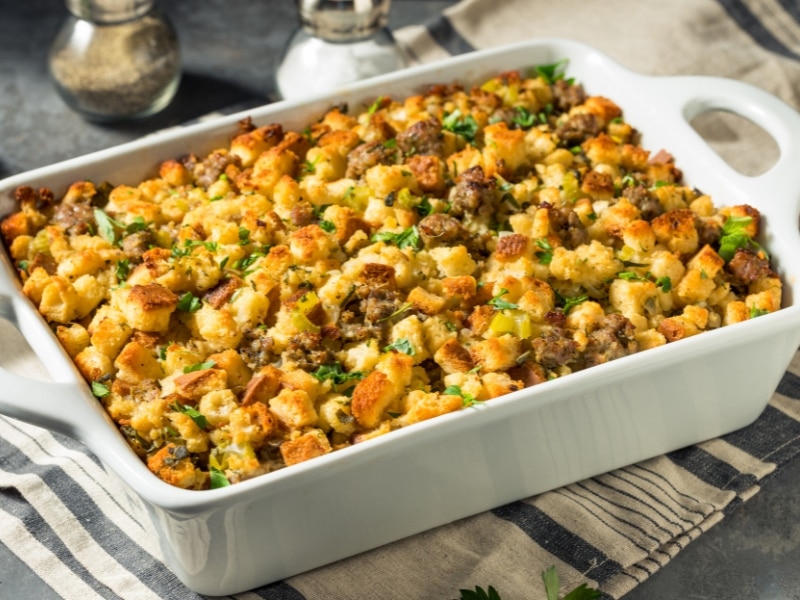 Stuffing Dressing on a White Pan Garnished With Thyme
