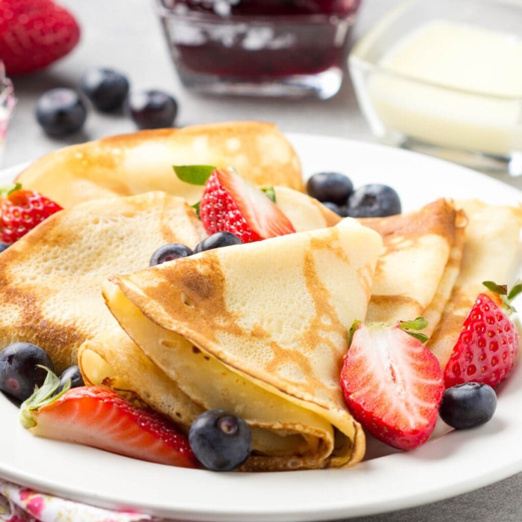 Fluffy Thin Swedish Pancakes With Fresh Berries
