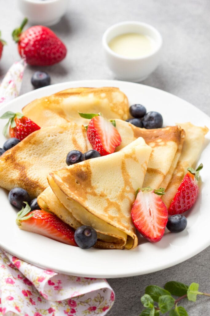 Swedish Pancakes Garnished With Fresh Berries
