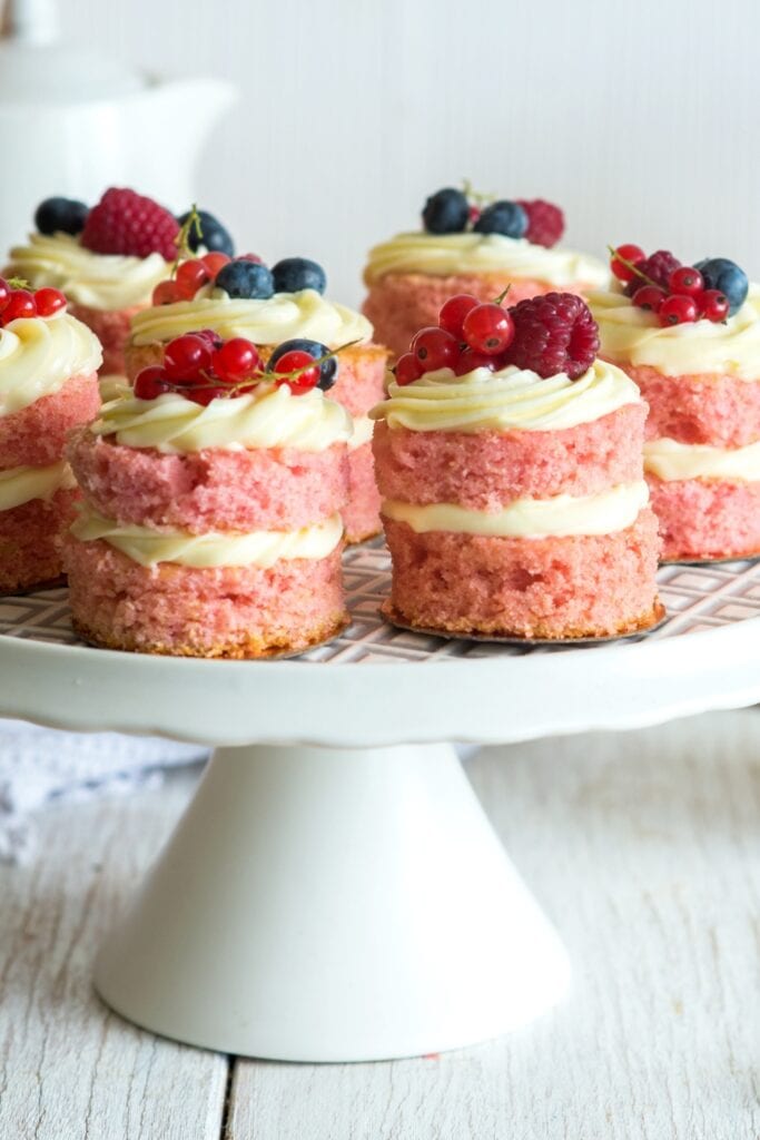 Sweet Homemade Pink Mini Cakes with Berries