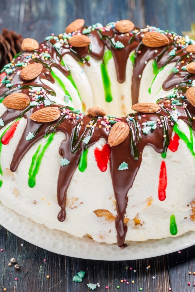 Sweet Ice Cream Cake with Chocolate Syrup and Nuts