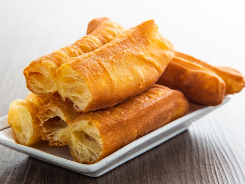 Youtiao (Chinese Fried Dough) on a Serving Plate