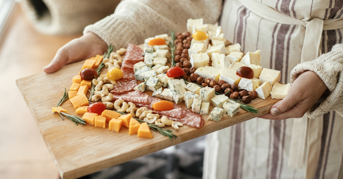 Appetizers in Charcuterie Board Including Cheese, Salami and Nuts