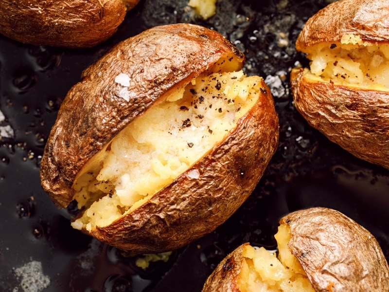 Baked Potatoes with Butter, Black Pepper and Sea Salt