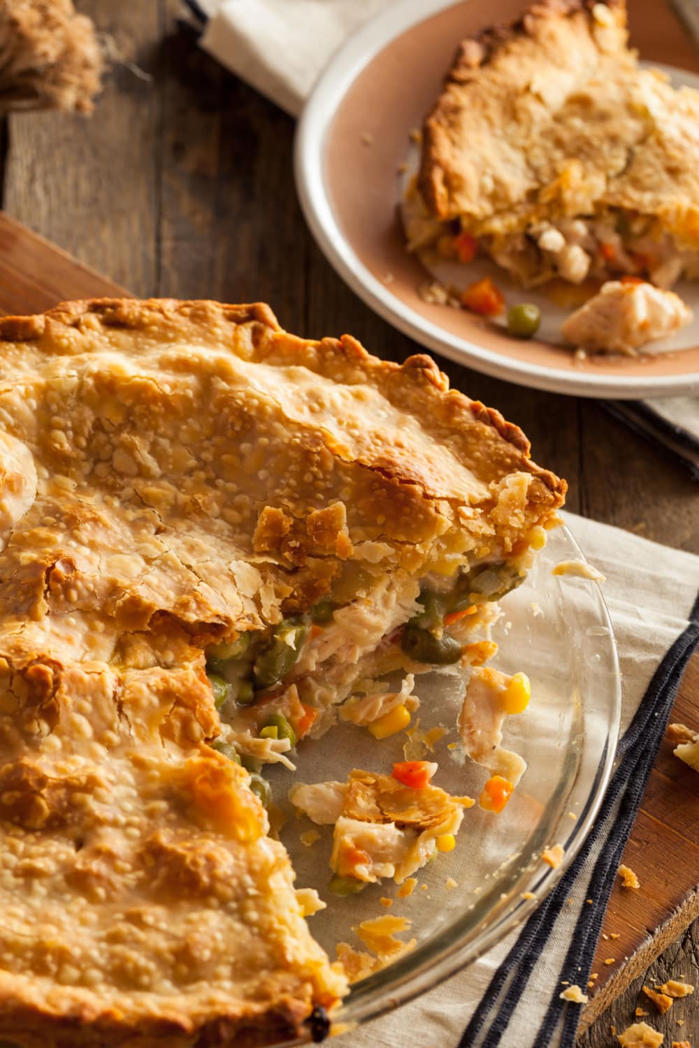 Bisquick Chicken Pot Pie With A Golden Crust, Filled With Chicken, Vegetables, And A Side Of Corn
