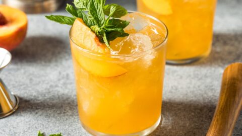 Boozy Refreshing Peach Bourbon Smash with Cold Ice