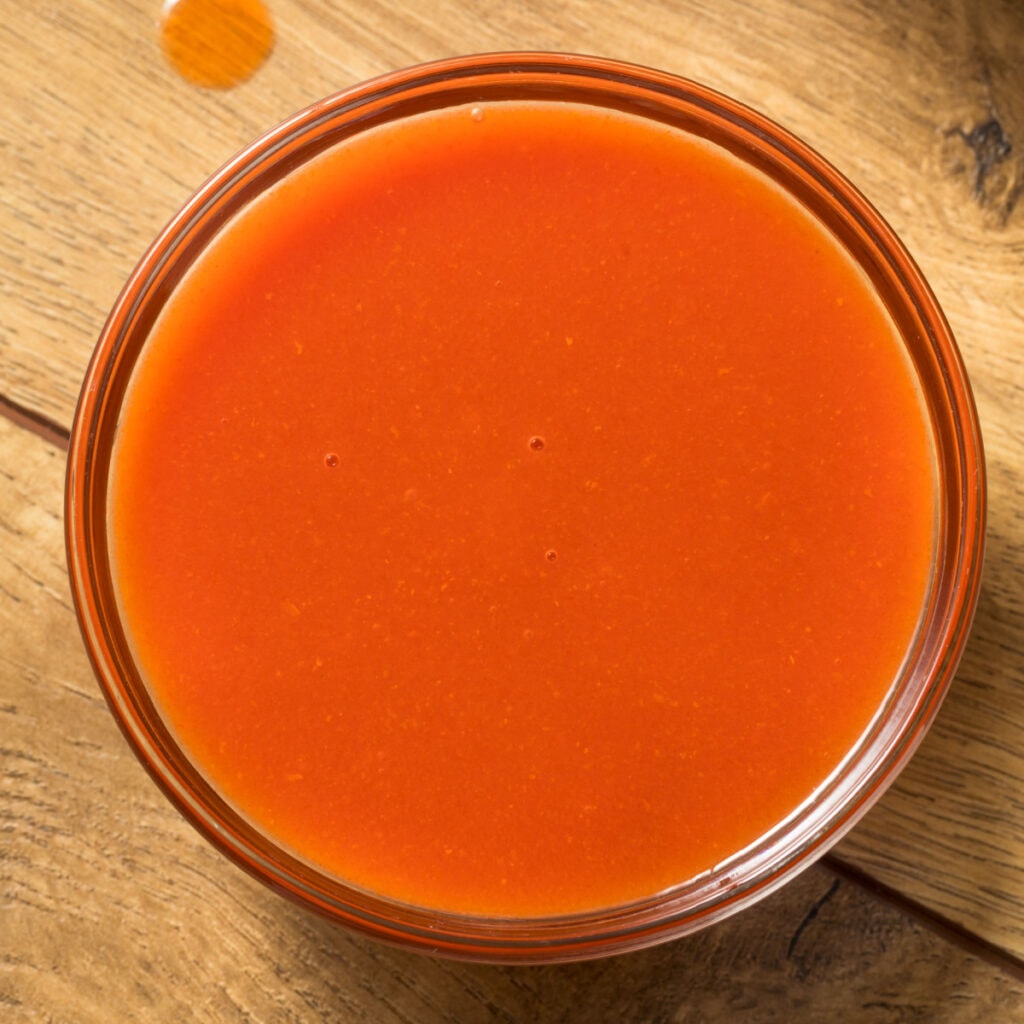 Buffalo Chicken Wing Sauce in a Glass Bowl