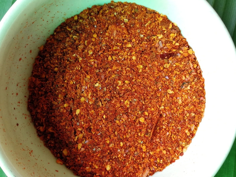 Cayenne Pepper + Ground Coriander Mixed in a White Bowl