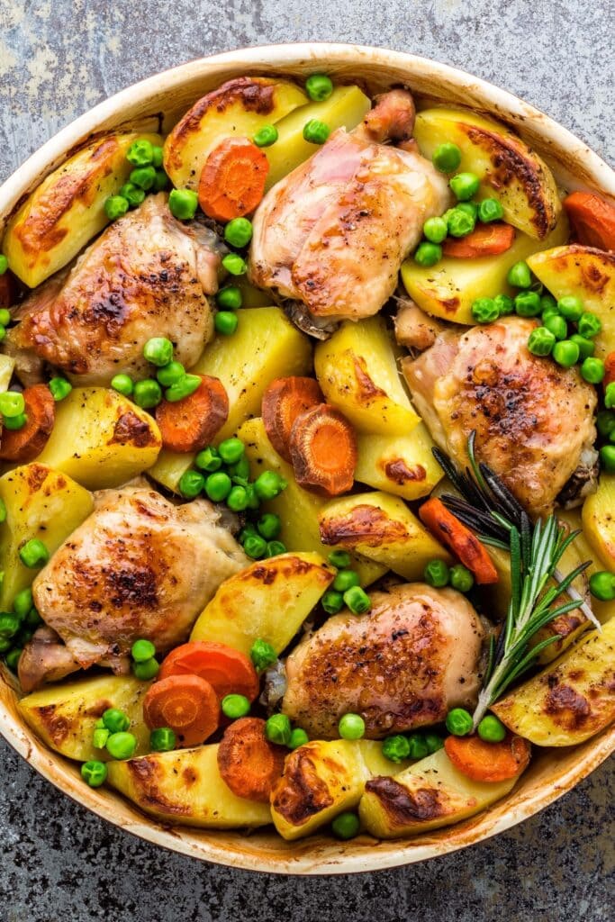 Chicken Thighs with Potatoes, Carrots and Peas