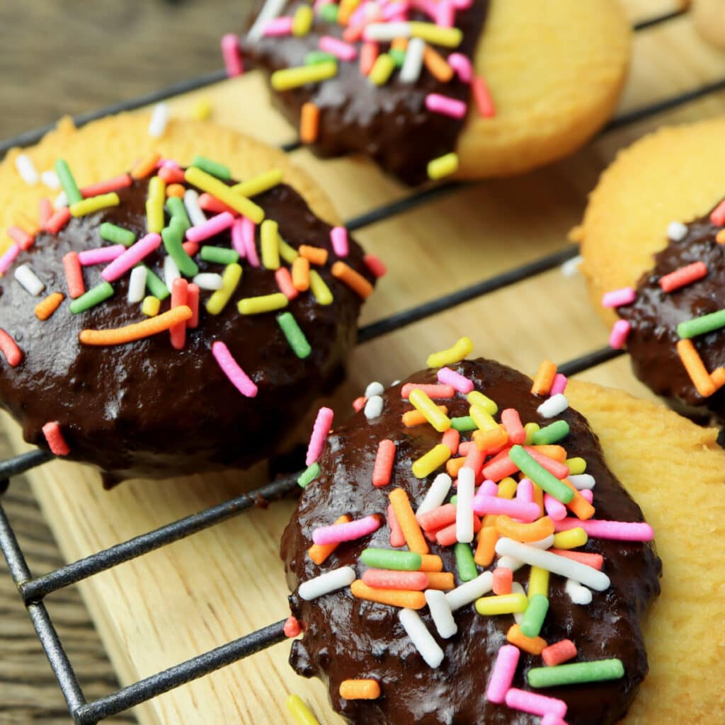Chocolate-Dipped Shortbread Cookies on a Baking Rack