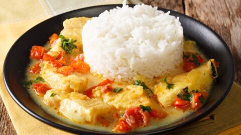 Ecuadorian Food: Fish and Rice with Coconut Sauce and Tomatoes
