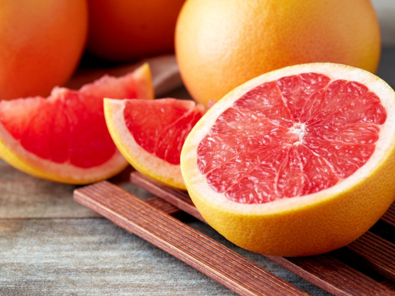 Grapefruits on a Wooden Table and Palette