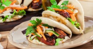 Homemade Asian Steamed Buns with Pork Belly and Vegetables