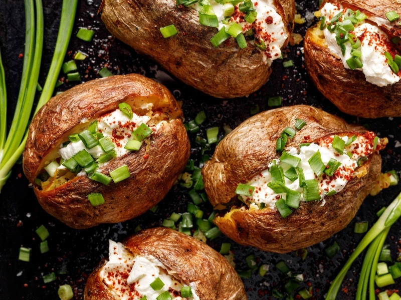 Homemade Baked Potatoes with Cream Cheese, Green Onions and Paprika