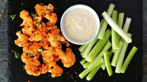 Homemade Buffalo Cauliflower Wings with Celery and Dipping Sauce