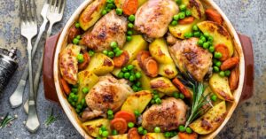 Homemade Chicken Thighs with Potatoes, Carrots and Peas