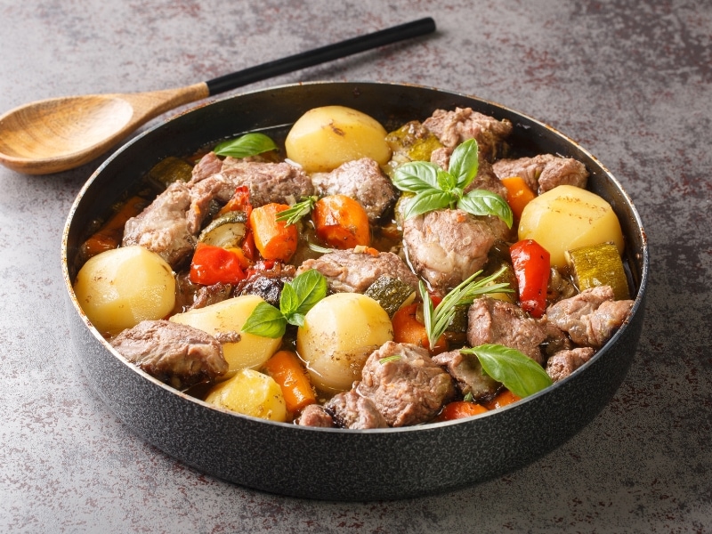 Homemade Croatian Food Peka with Lamb Meat, Potatoes and Carrots