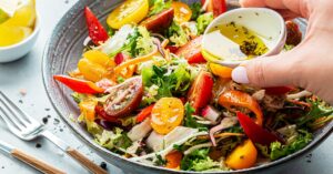 Homemade Green Salad with Red and Yellow Tomatoes