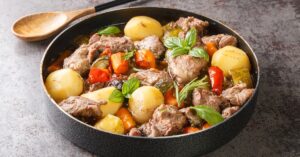 Homemade Peka with Lamb Meat, Potatoes and Carrots in a Casserole