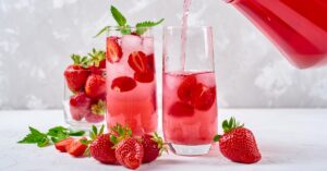 Homemade Refreshing Strawberry Lemonade Poured in a Glass
