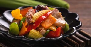 Homemade Stir-Fried Salted Pork with Peppers and Baby Corn