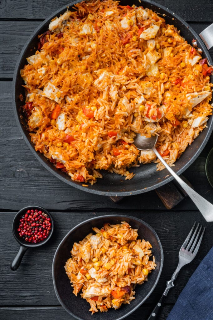 Mexican Chicken and Rice in a skillet and served in a bowl