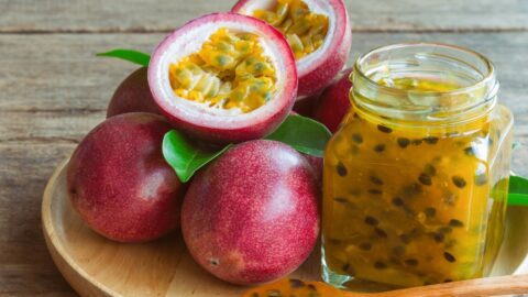 Passion Fruit in a Glass Jar with Fresh Fruits