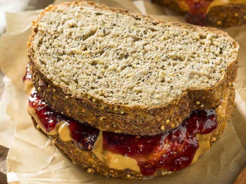 Peanut Butter and Jelly Sandwiches on a Parchment Paper