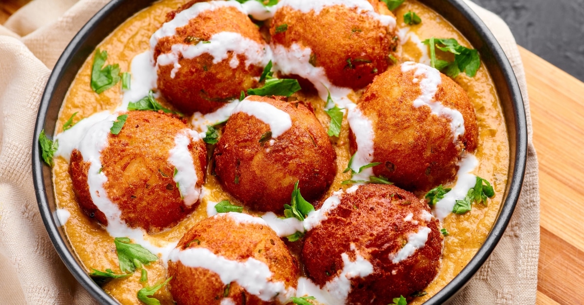 Potato and Cheese Balls with Tomato Gravy and Spices