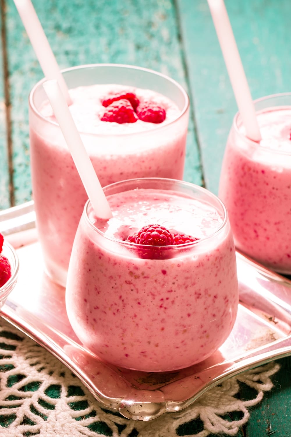 Glasses of Refreshing Raspberry Protein Milkshake With Fresh Berries 