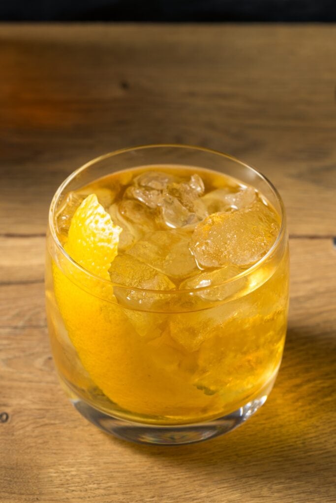 Rusty Nail Cocktail with Orange and Garnish