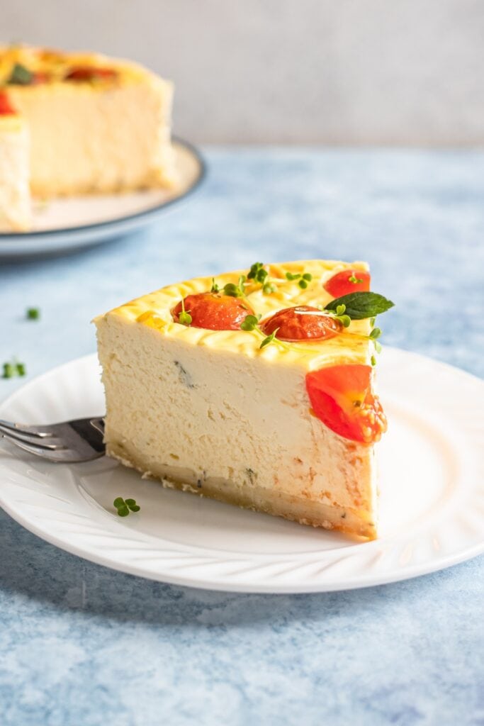 Slice of Savory Cheesecake with Tomatoes and Mint