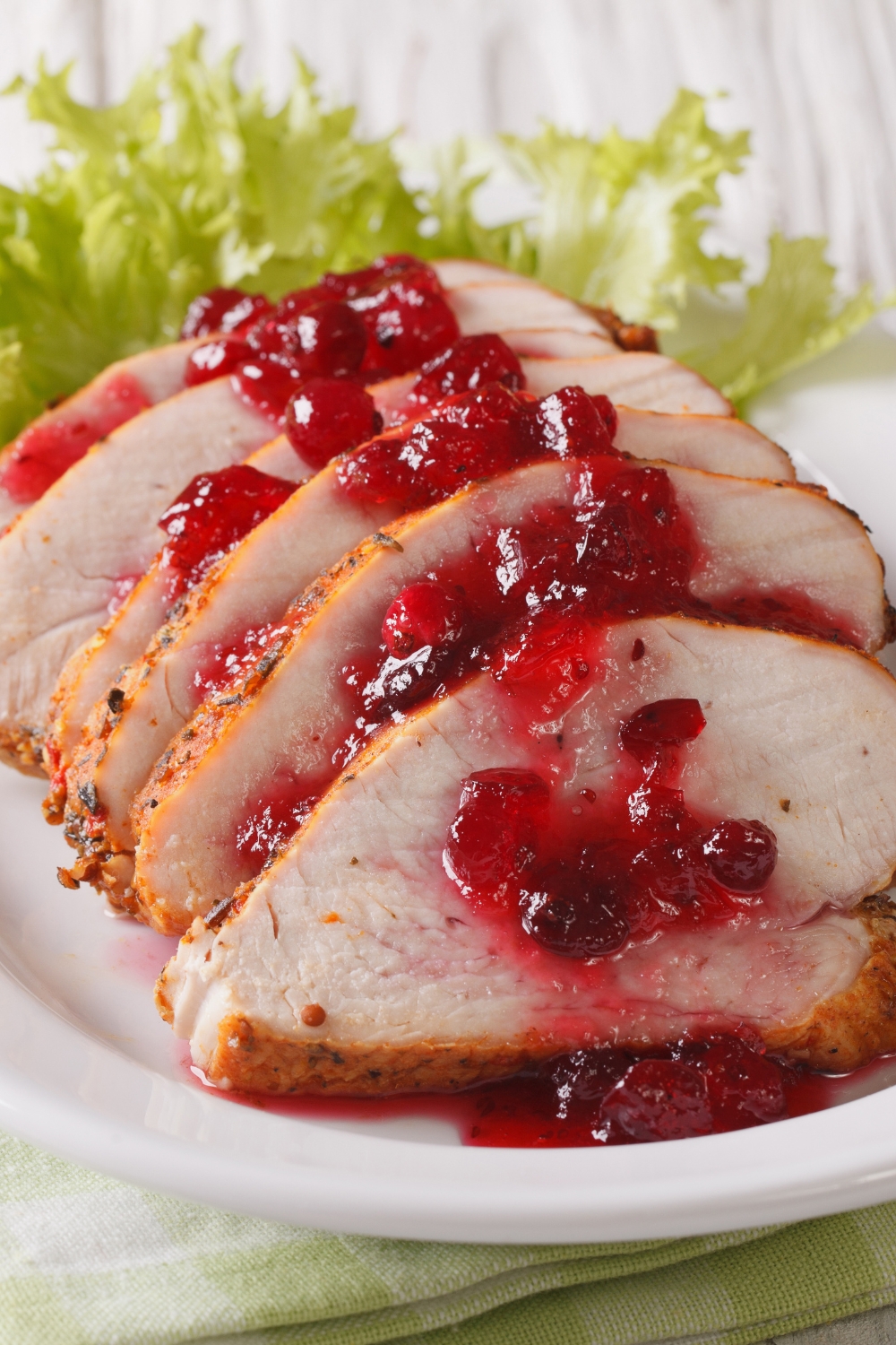Sliced Homemade Roasted Turkey with Cranberry Sauce