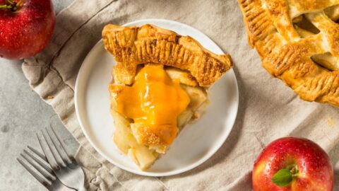 Sliced Homemade Sweet American Apple Pie with Cheddar Cheese