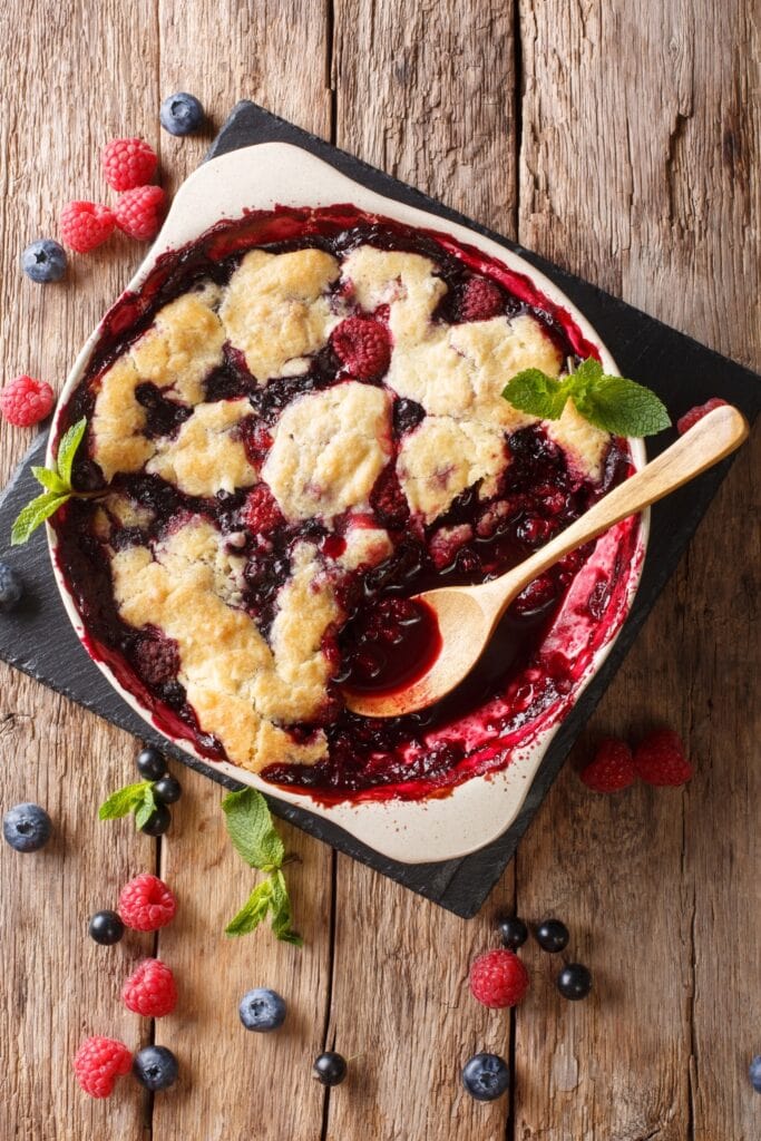 Sweet Homemade Berry Cobbler with Raspberries and Blueberries