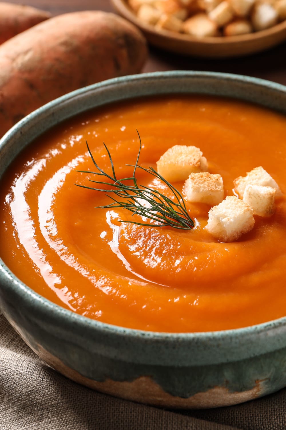 Sweet Potato Soup with Croutons in a Ceramic Bowl
