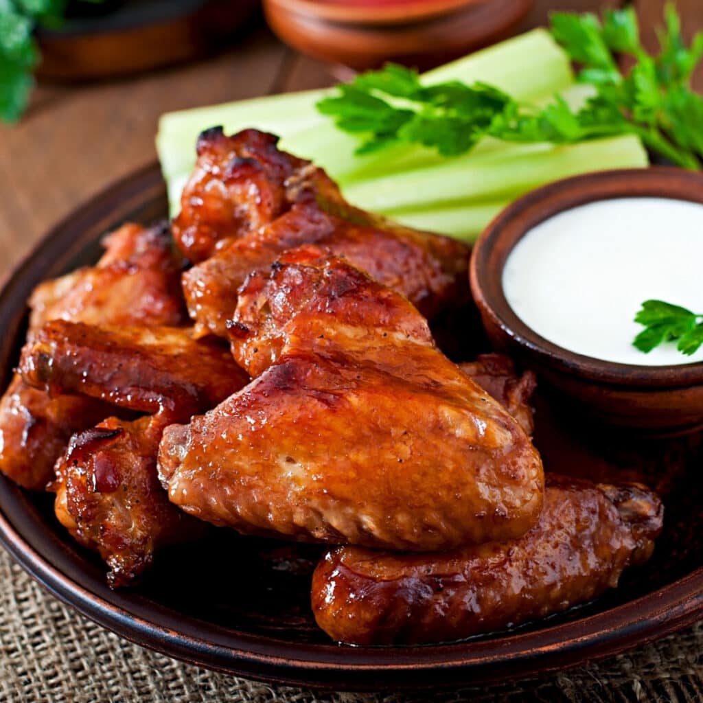 Teriyaki Chicken Wings with celery and dipping sauce