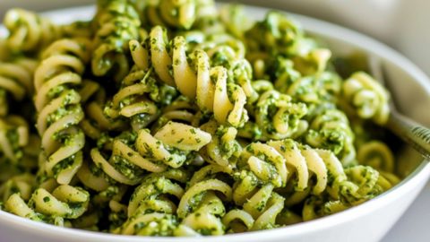 Close Up of Pesto Pasta in a White Bowl