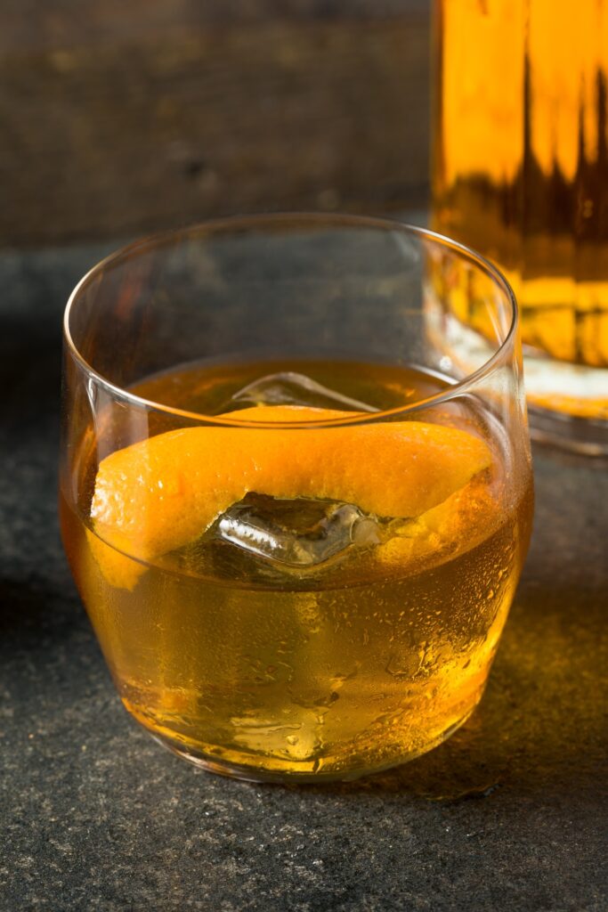 A Cold Glass of Japanese Old-Fashioned Cocktail with Orange Peel