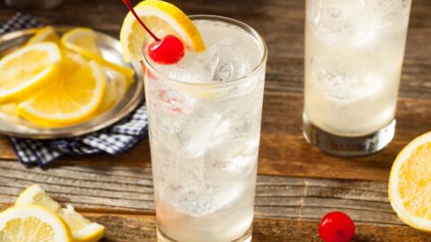 Classic Tom Collins Cocktail with Cherry and Lemon Slice