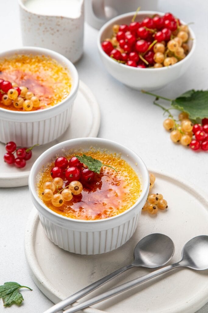 Creme Brulee with Caramelized Sugar and Decorated Berries