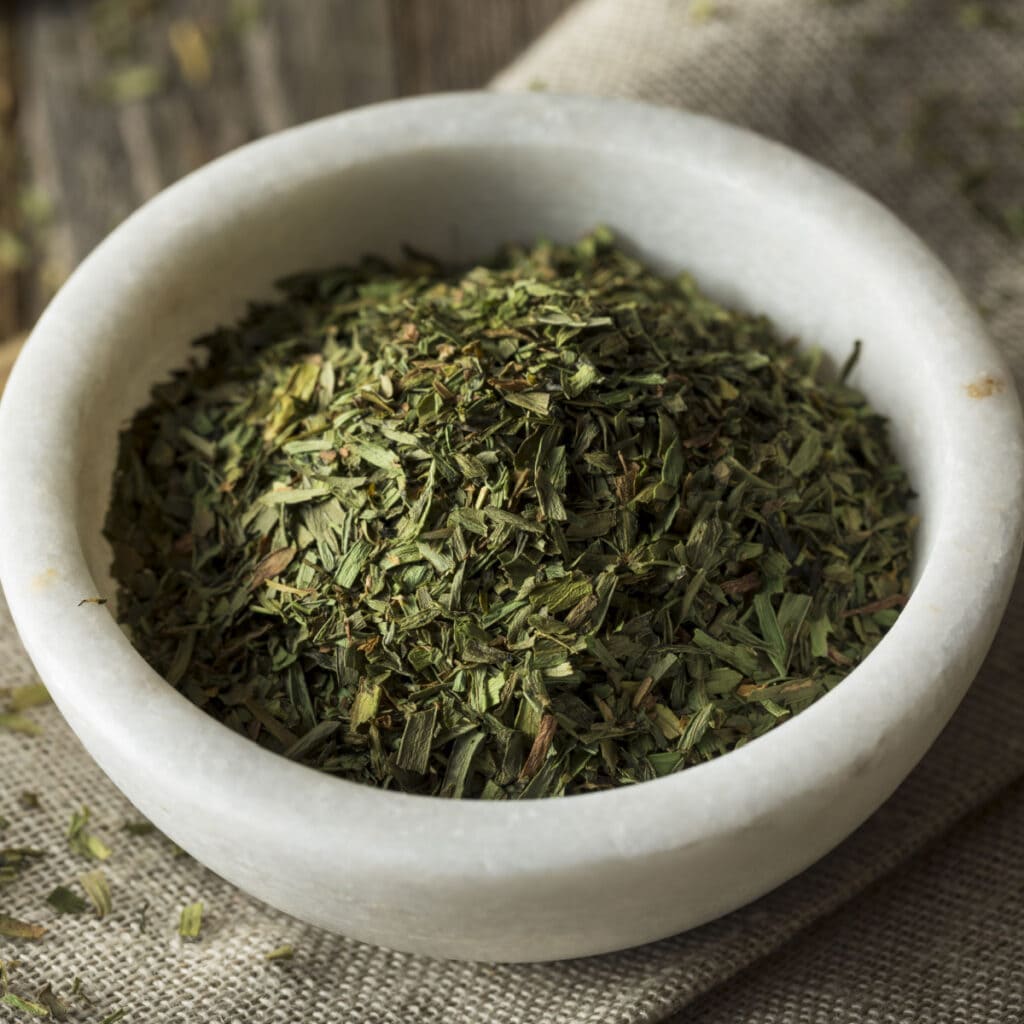 Dried Tarragon Leaves on a Spice Bowl
