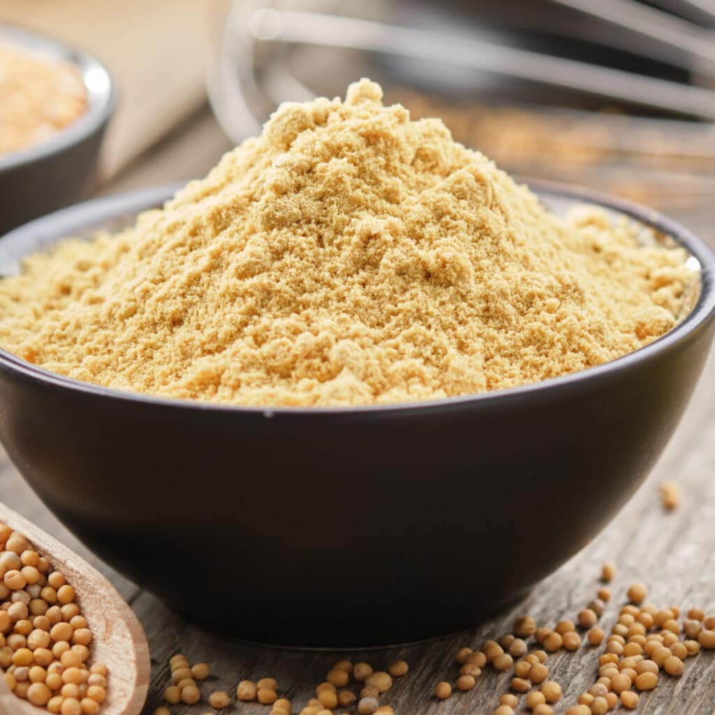 Dry Mustard in a Wooden Bowl