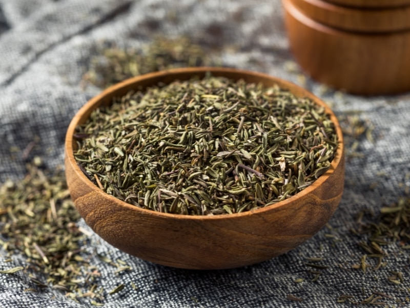 Dry Organic Thyme in a Wooden Bowl