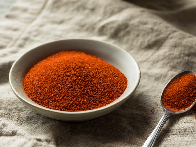 Dry Red Organic Red Smoke Paprika in a White Bowl