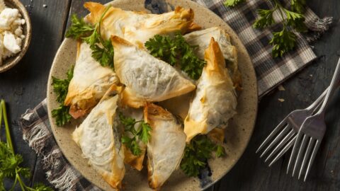 Greek Spanikopita with Spinach and Feta in a Wooden Gray Background
