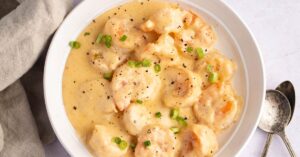 Homemade Creamy Shrimp Newburg with Sherry Wine in a White Bowl